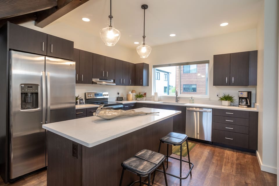 The kitchen is brand-new with stainless steel appliances | Main Level