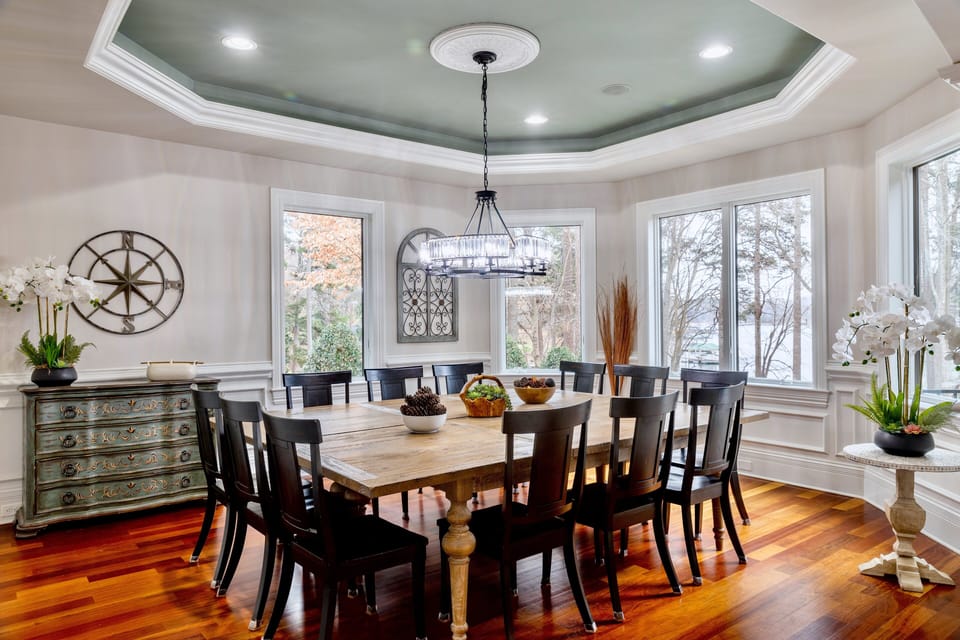 Large dining room with table seating for 12 or more.
