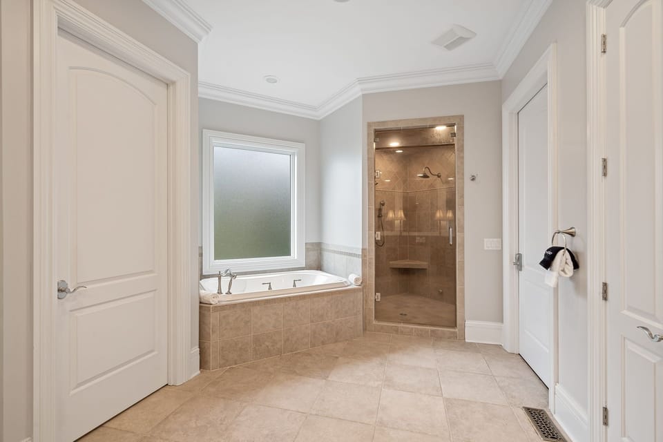 Main level primary suite bathroom.