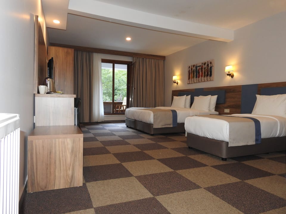 Deluxe Room | Premium bedding, free minibar, in-room safe, individually furnished