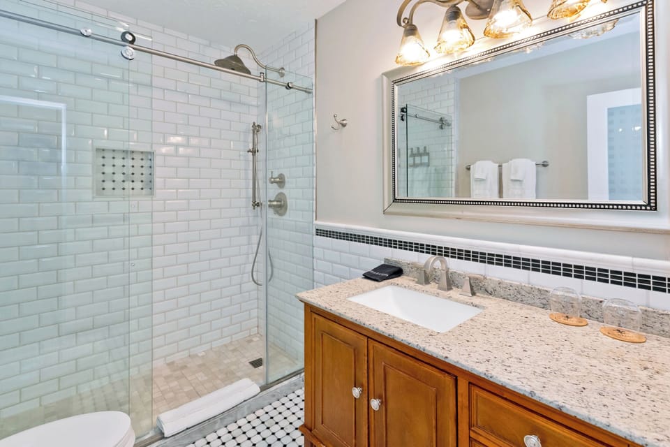 Rainfall showerhead, designer toiletries, hair dryer, bathrobes