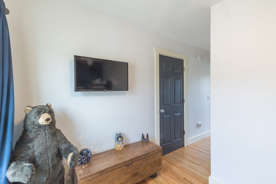 3rd bedroom Top of the Town Rental Home - Our 3rd bedroom is equipped with a Smart TV.