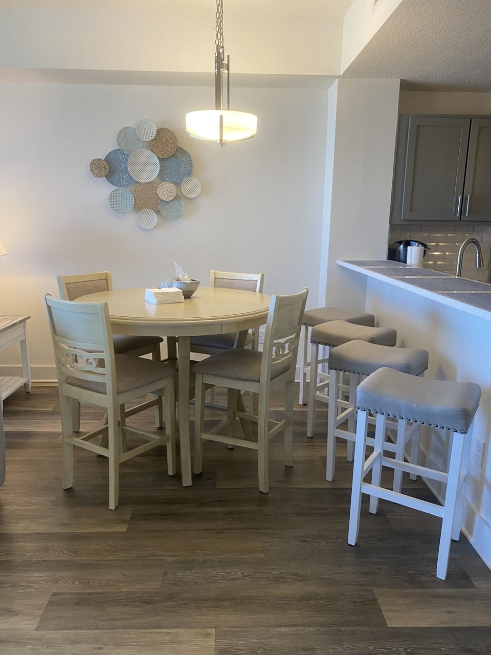 Dinning area with table and bar seating