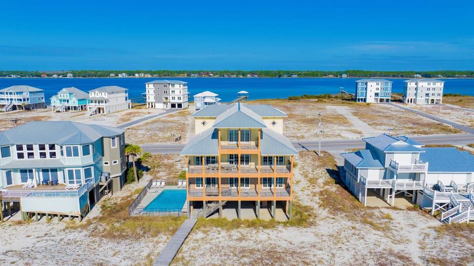 Sun N Sands is nestled between the Gulf and Little Lagoon on the desired West Beach Blvd of Gulf Shores
