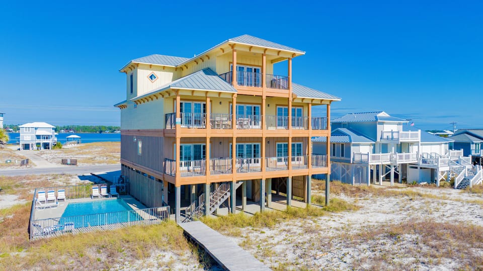 Sun N Sands offers luxury amenities such as a private boardwalk to the beach, private pool and elevator that takes you to every level with ease