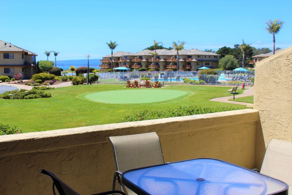 View from Balcony-Putting Green and South Bluff Pool 