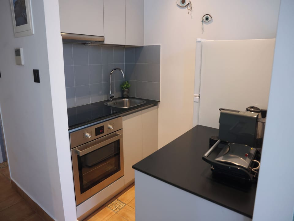 Family Studio, Balcony, Sea View | Private kitchen | Stovetop, espresso maker, coffee/tea maker, electric kettle