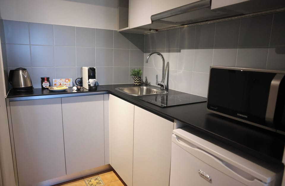 Family Double Room, Patio, Sea View | Private kitchen | Stovetop, espresso maker, coffee/tea maker, electric kettle