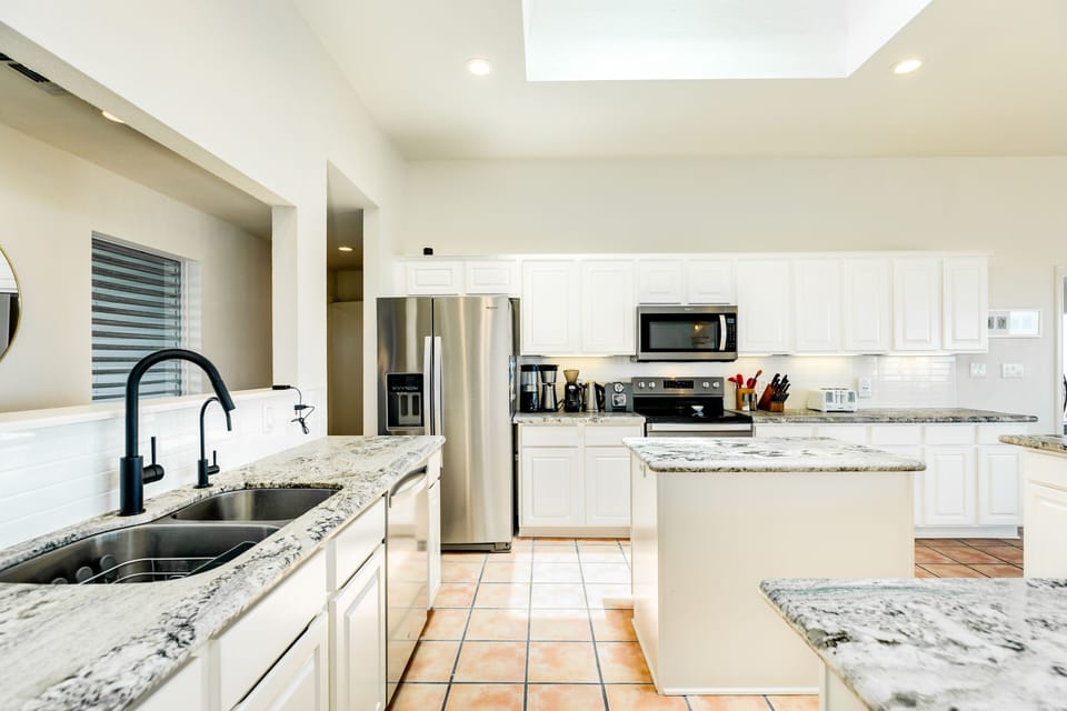 Fully equipped kitchen with stainless steel appliances