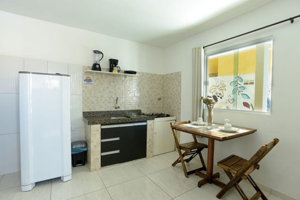 Family Room | Private kitchen | Fridge, blender, cookware/dishes/utensils, dining tables