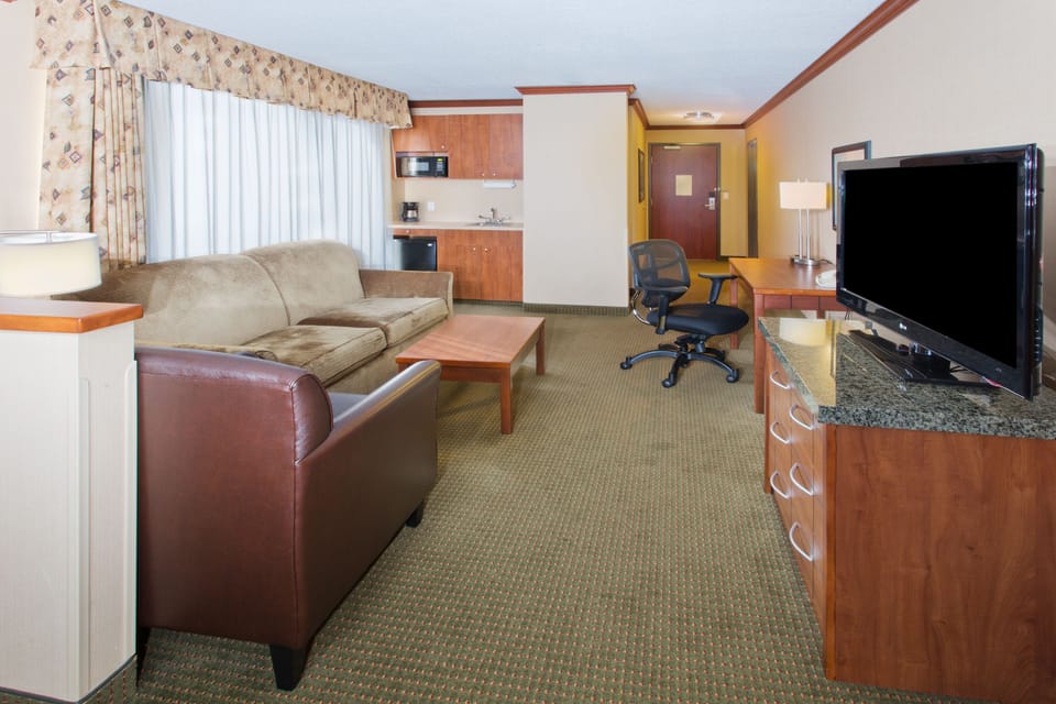 In-room safe, desk, iron/ironing board, free cribs/infant beds