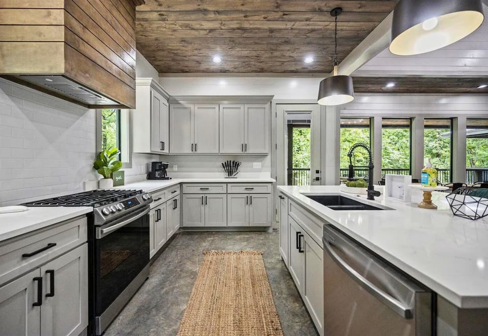 Savor the flavors of your getaway in our sleek kitchen, where style and practicality are perfectly paired.