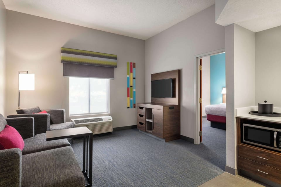 Suite, 1 Bedroom, Non Smoking | Living area | 40-inch LED TV with premium channels, TV