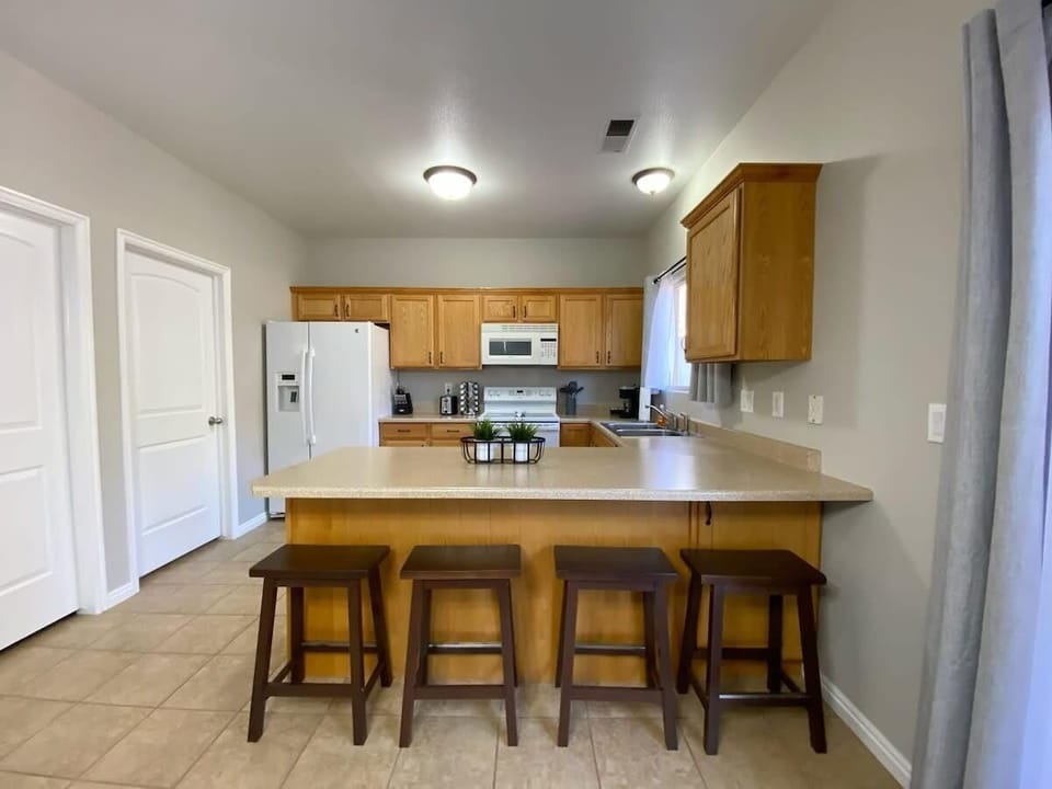 Have a seat in the kitchen and have an ice cold drink.