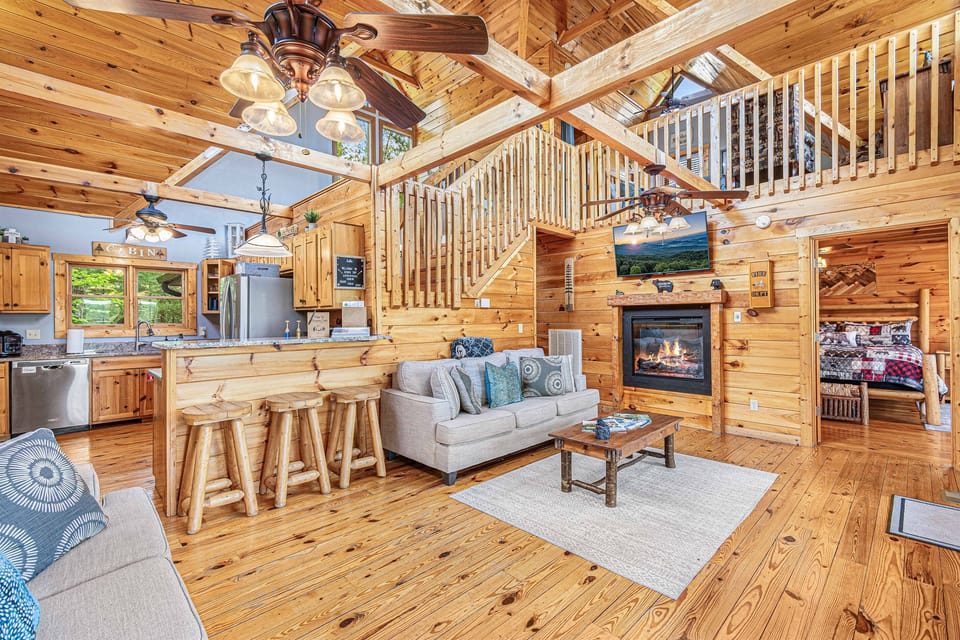 Cozy up on our spacious main floor with dual fireplace. There's one in the master bedroom too!