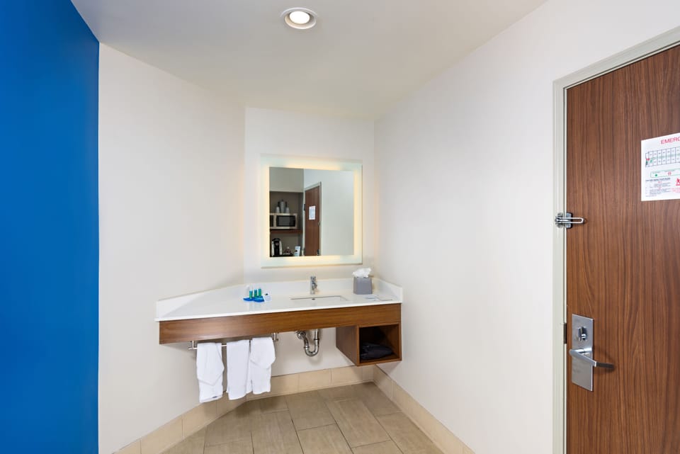 Combined shower/tub, hair dryer, towels, soap
