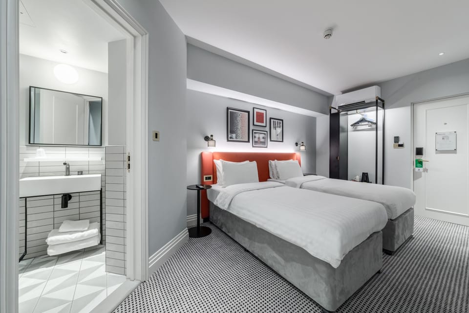 Executive Room, 2 Twin Beds, Non Smoking | In-room safe, desk, laptop workspace, iron/ironing board