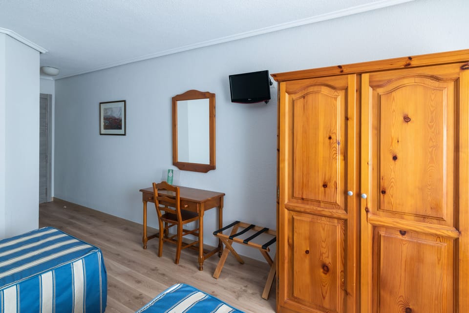 Desk, iron/ironing board (on request), WiFi (free), bed sheets