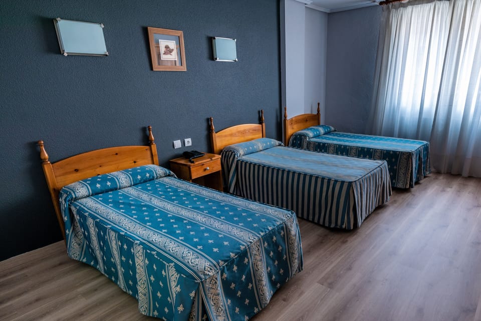 Desk, iron/ironing board (on request), WiFi (free), bed sheets