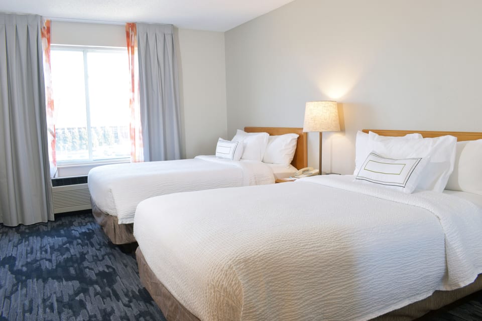 Hypo-allergenic bedding, in-room safe, desk, laptop workspace