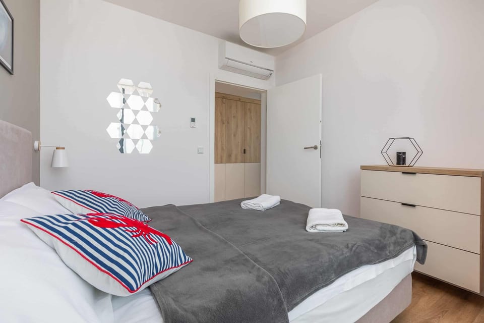 A large window in the bedroom allows for plenty of natural light. 