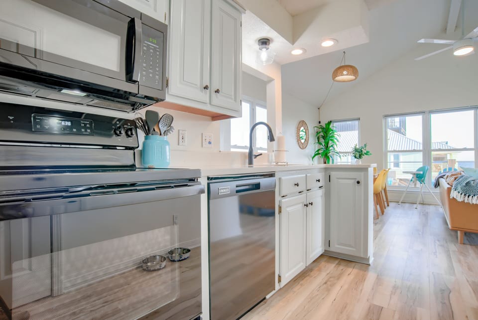 The cozy kitchen, overlooking the dining area so you can entertain while cooking