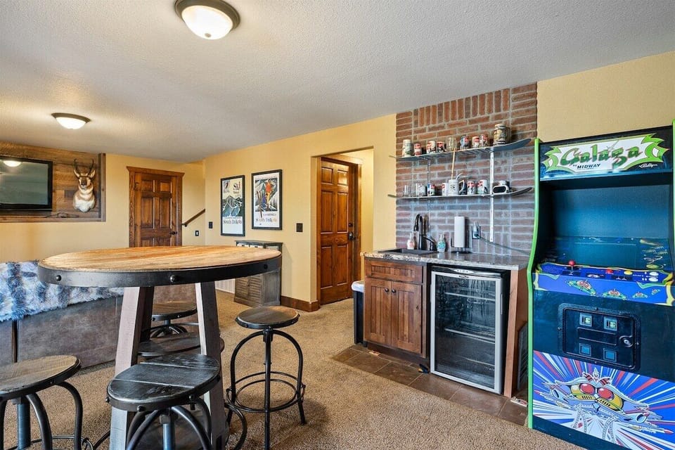 Lower level family room with games, wetbar