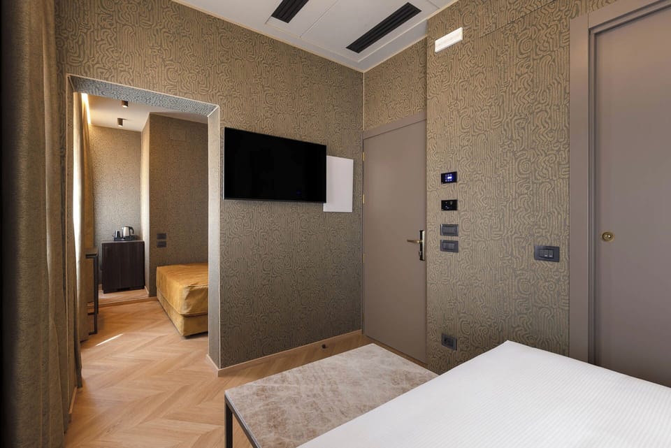 Family Triple Room | Hypo-allergenic bedding available, memory foam beds, minibar