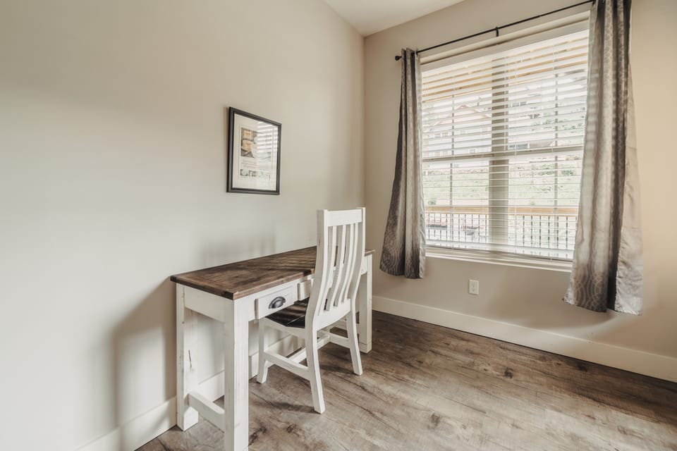 Desk and chair in the double queens bedroom. 