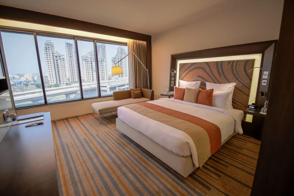 Premium bedding, down comforters, minibar, in-room safe