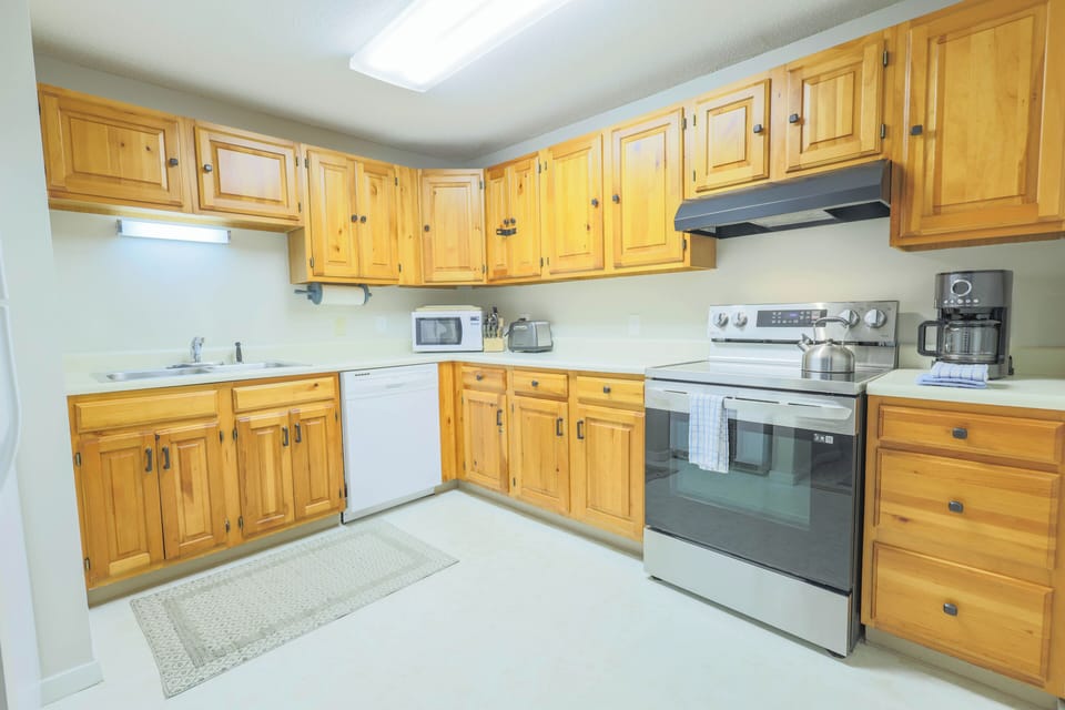 Equipped with fullsize appliances, dishware, flatware, glassware, cookeware and cooking utensils.