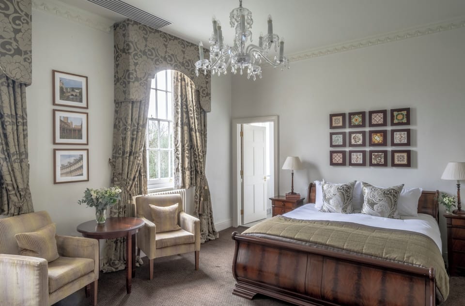 Deluxe King bedded room in historic Mansion House | In-room safe, desk, blackout drapes, iron/ironing board