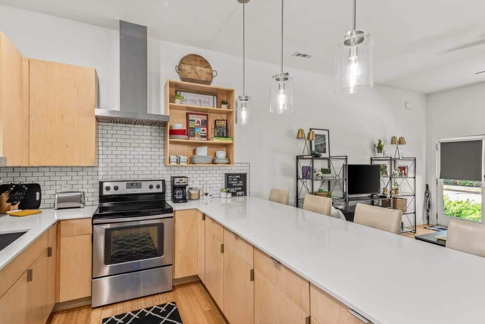 Spacious kitchen bar and dining area—great for cooking, dining or working remotely.