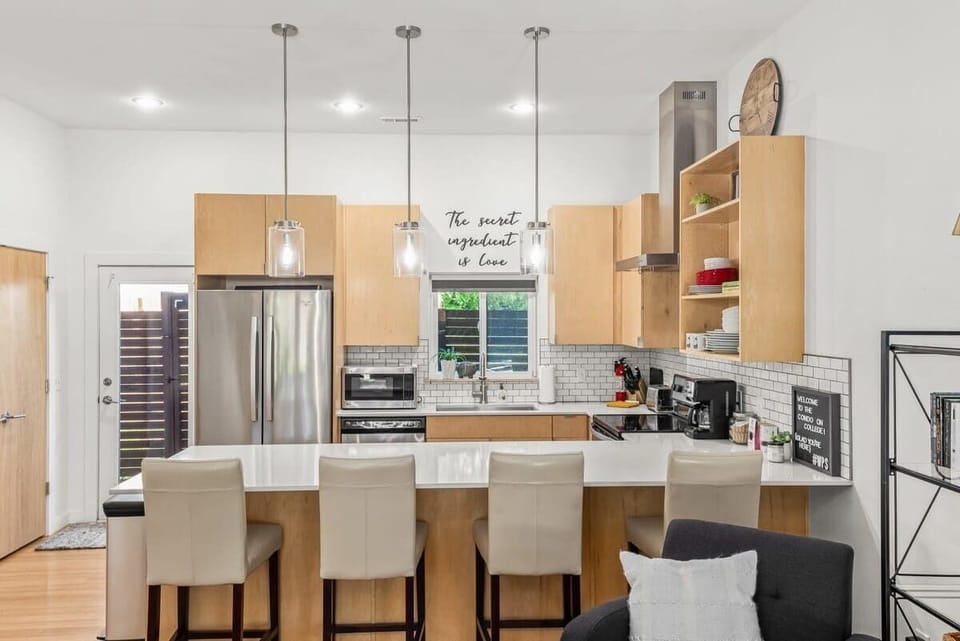 Breakfast bar seats four—perfect for casual dining or morning coffee.