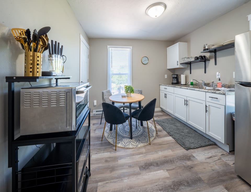 Kitchen dining with everything needed to cook. We provide coffee, creamer, sugar