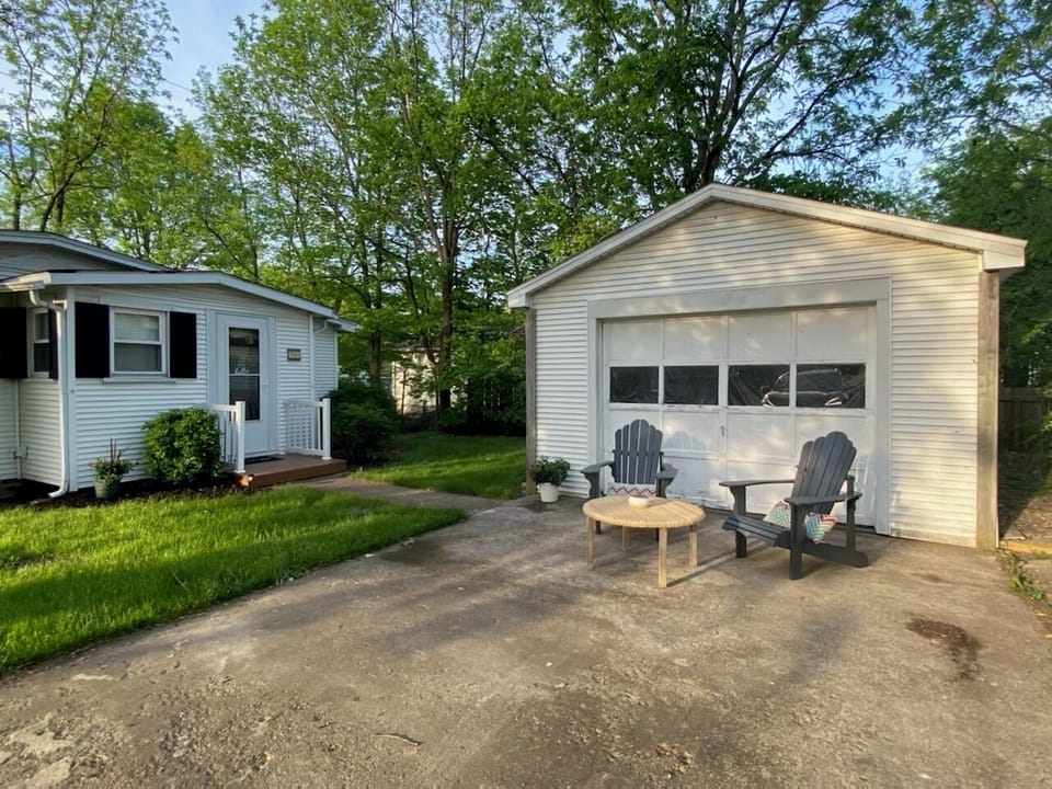Outdoor furniture-dining table & chairs for outdoor enjoyment located in shed