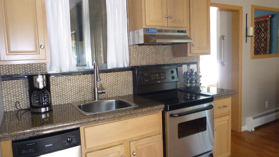 full kitchen with stainless appliances