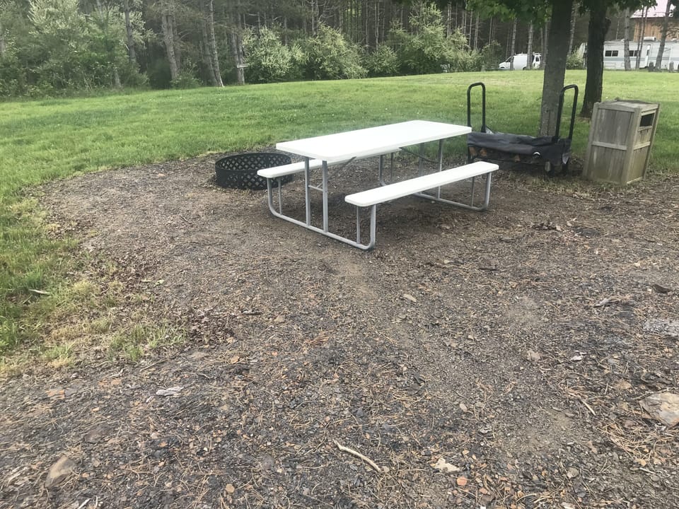 pad now has limestone gravel and a park-style charcoal grill 