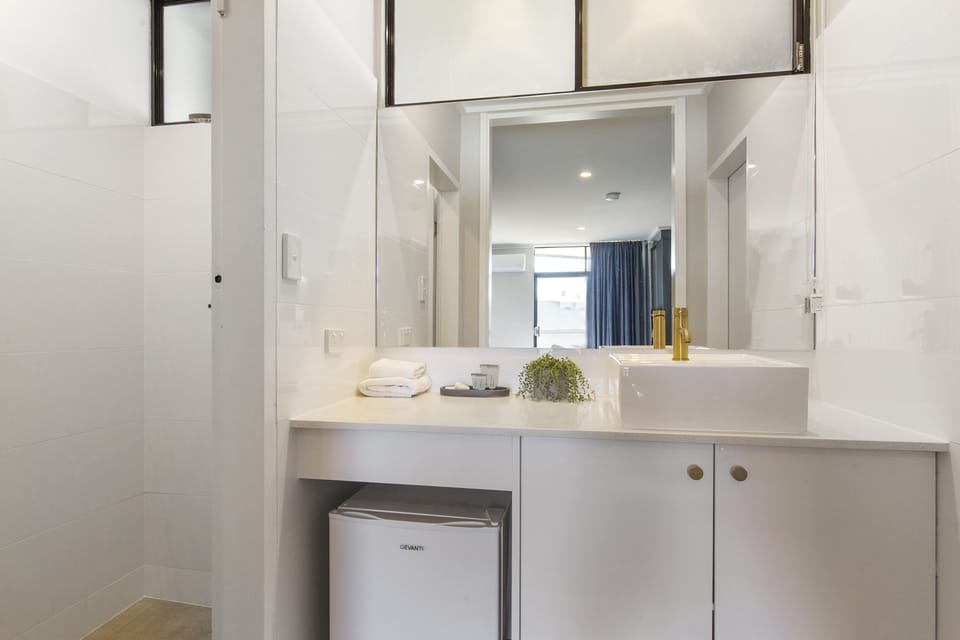Deluxe Family | Bathroom | Shower, designer toiletries, hair dryer, towels