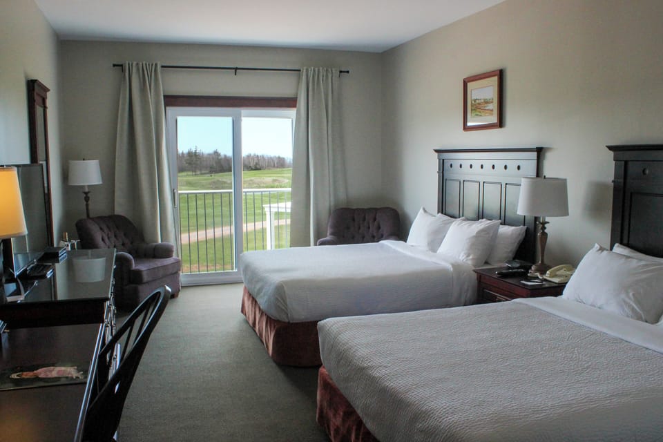 Deluxe Room, 2 Queen Beds, Golf View | Hypo-allergenic bedding, pillowtop beds, in-room safe, desk