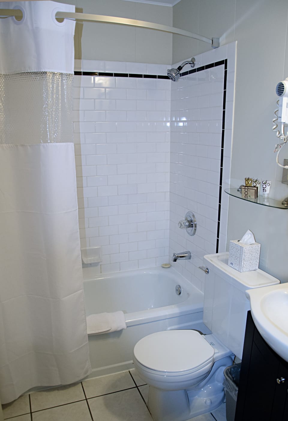 Shower, designer toiletries, hair dryer, bathrobes