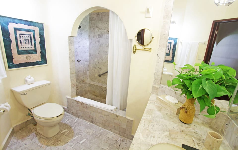 Deep soaking tub, rainfall showerhead, free toiletries