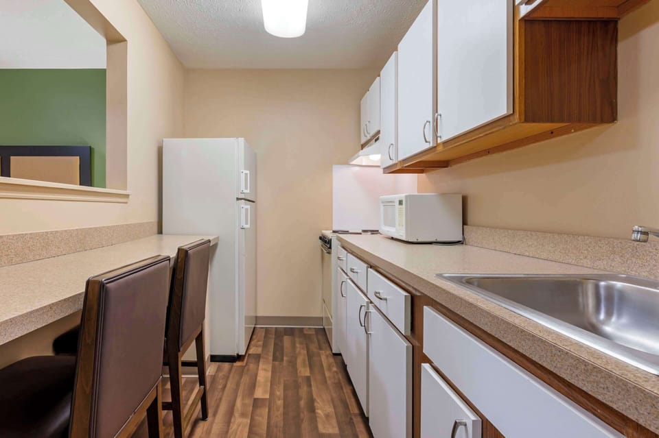 Room, 1 Queen Bed with Sofa bed, Non Smoking (Efficiency) | Private kitchen | Full-size fridge, microwave, stovetop, cookware/dishes/utensils