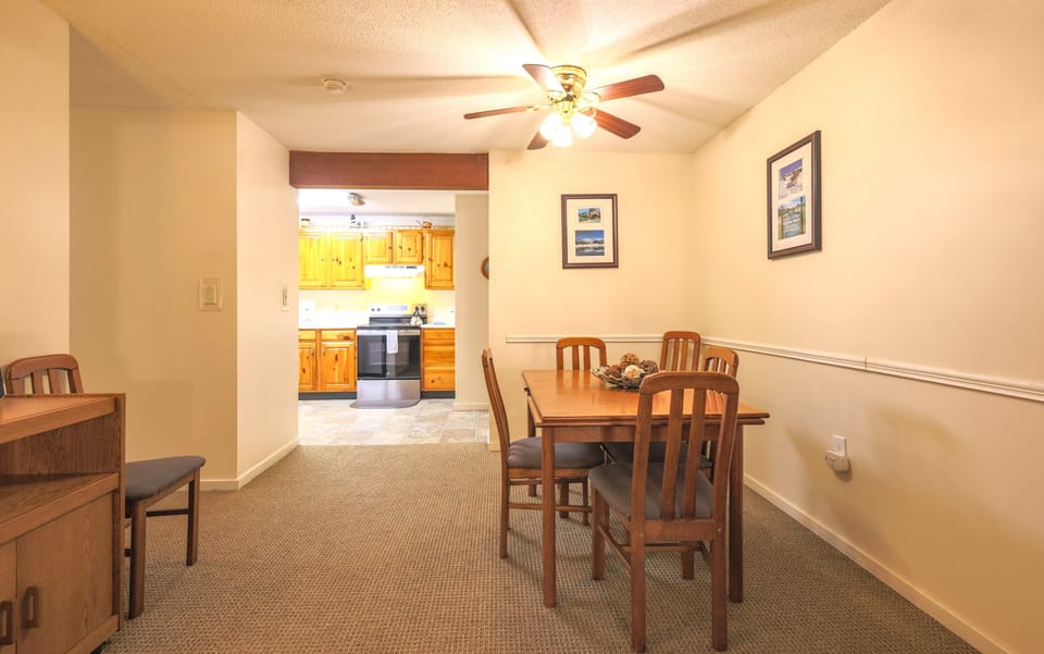 Dining table seats 6 people comfortably.