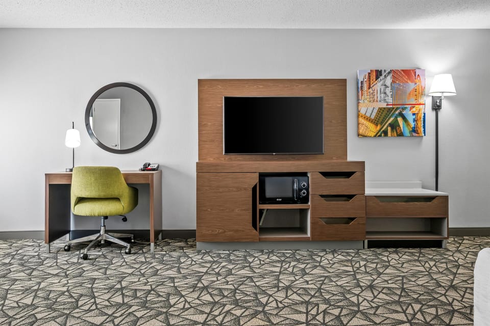 Suite, 1 King Bed, Non Smoking | In-room safe, blackout drapes, iron/ironing board, cribs/infant beds