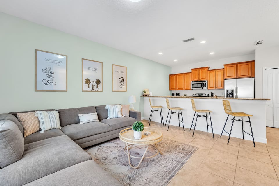 Large living room, kitchen, and dining area to gather