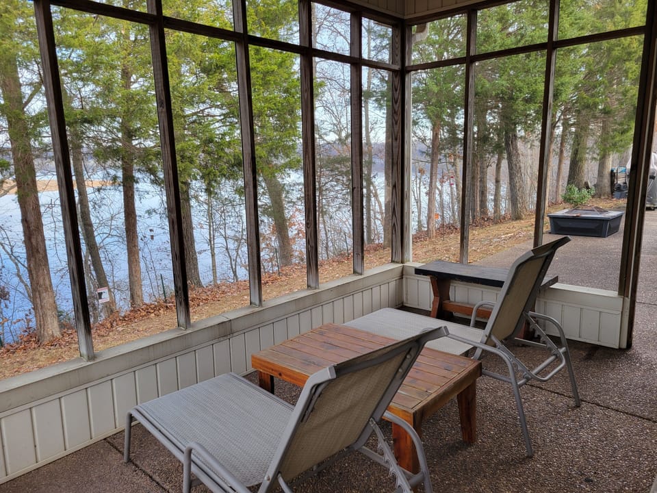 screened in porch off of master bedroom 