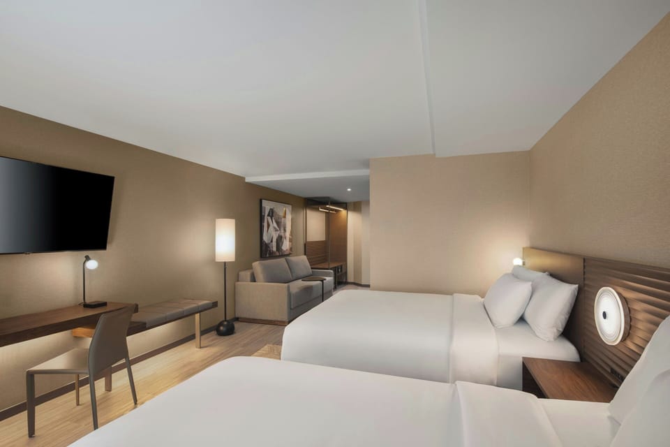 Room, 2 Queen Beds | Hypo-allergenic bedding, pillowtop beds, in-room safe, desk