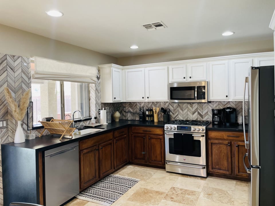 Fully equipped kitchen for family meals and morning coffee.