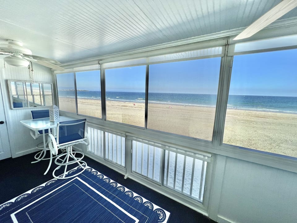 Enjoy your coffee/breakfast on your 3 season porch watch the waves roll in